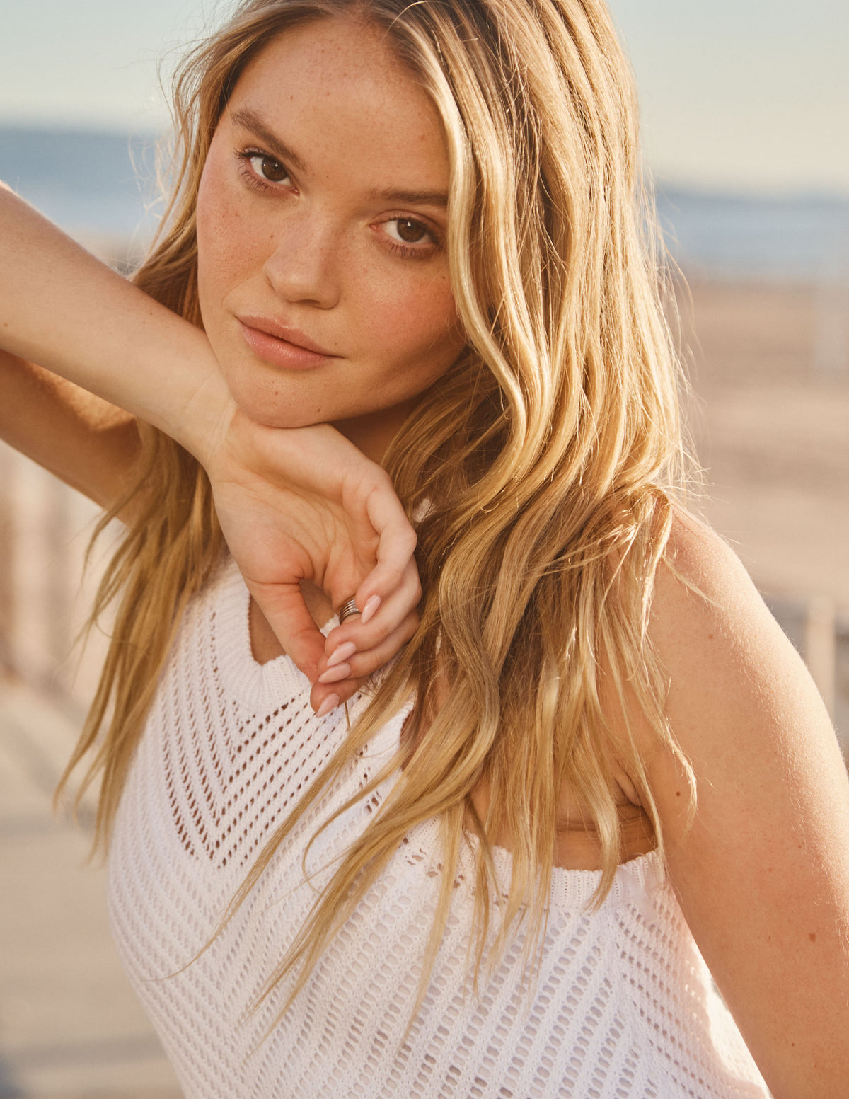 Sundry Racer Back Dress in Optic White- close up and model is handing her face up with her arm 