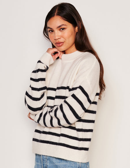 Sundry Stripes Mock Neck Cozy Sweater-3/4 front view model is smirking