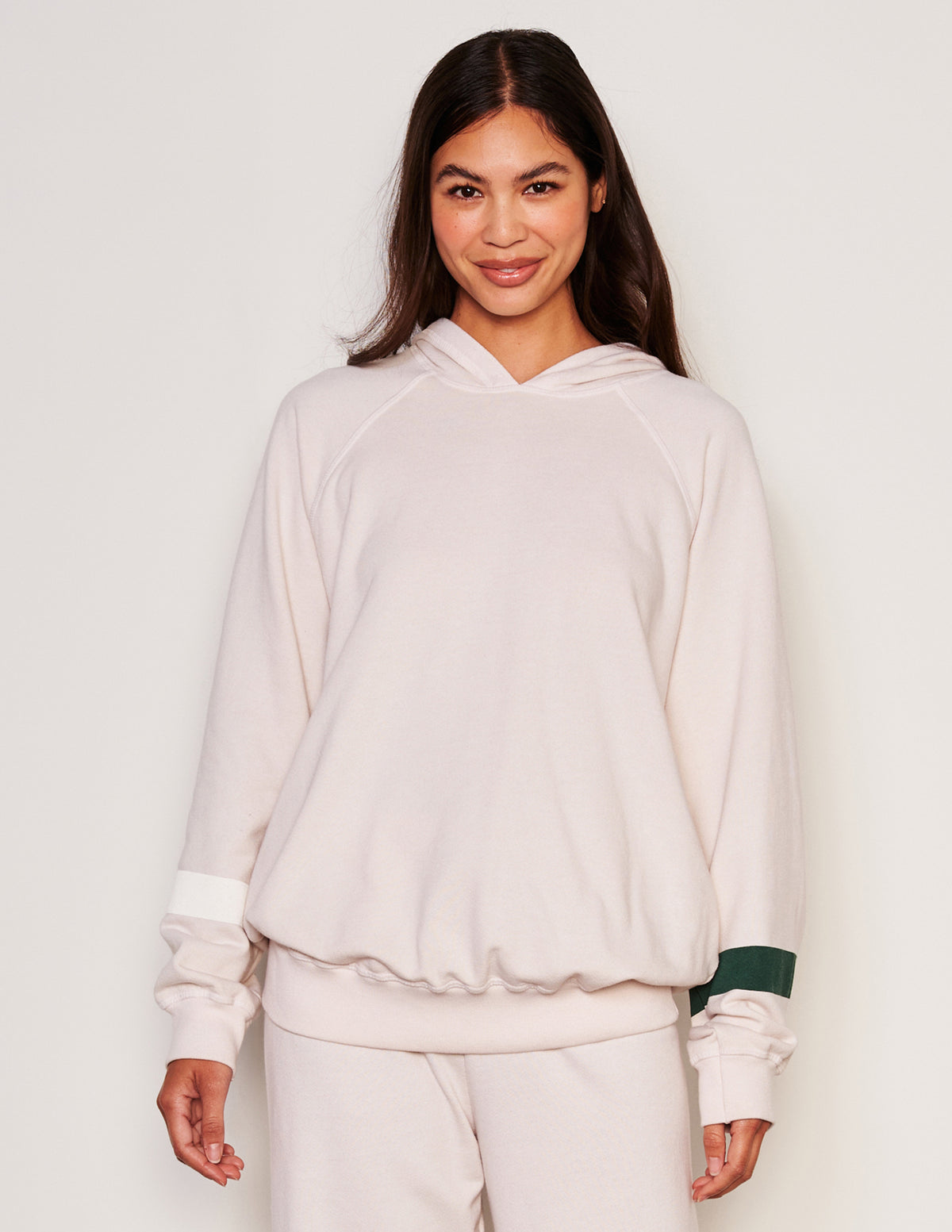 Sundry Stripes Raglan Popover Hoodie-3/4 front model is smirking