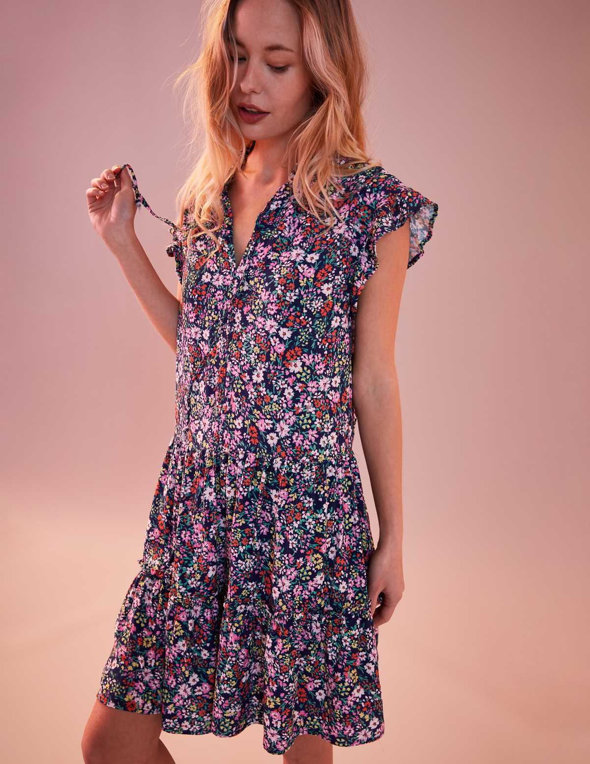 Sundry Mini Field Dress-close up and model is holding the string of her dress