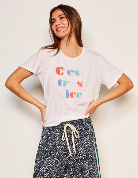 Sundry C'est Crew Neck Tee in Optic White-3/4 front view model is smiling