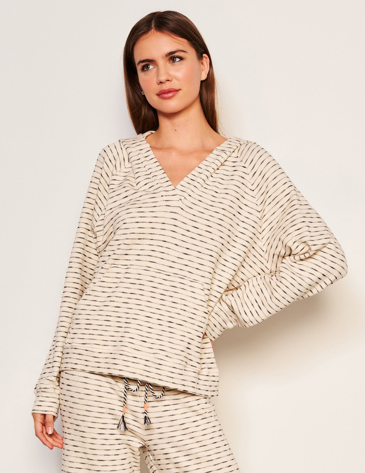 Sundry Pullover Hoodie in Oyster-model has her on her hip