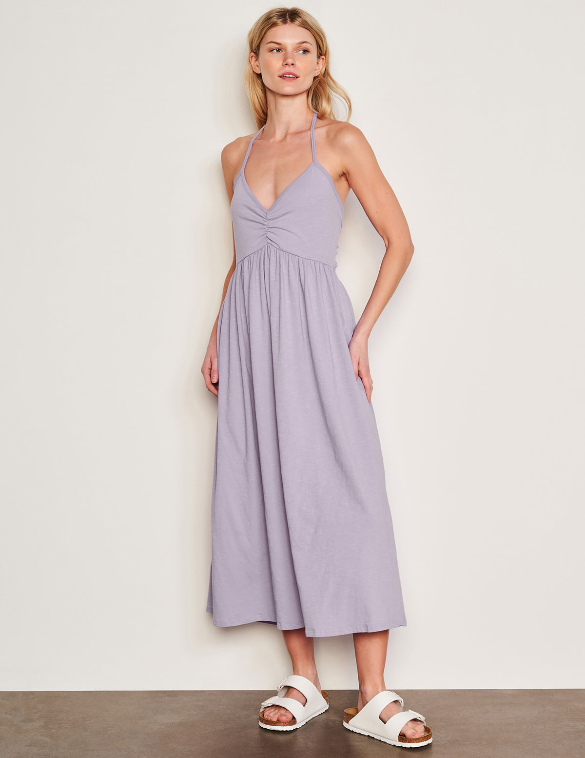 Sundry Tie Back Dress in Dark Lavender-full front view model is looking off to the side 