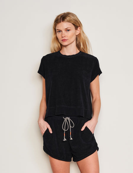 Sundry Courtside Pullover in Black-3/4 front view model has her hands in her pocket