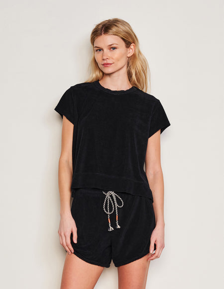 Sundry Courtside Pullover in Black-3/4 front view model has her hands in her pocket