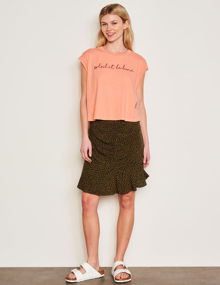 Sundry Clover Short Femme Skirt in Olive-full view model is smiling 