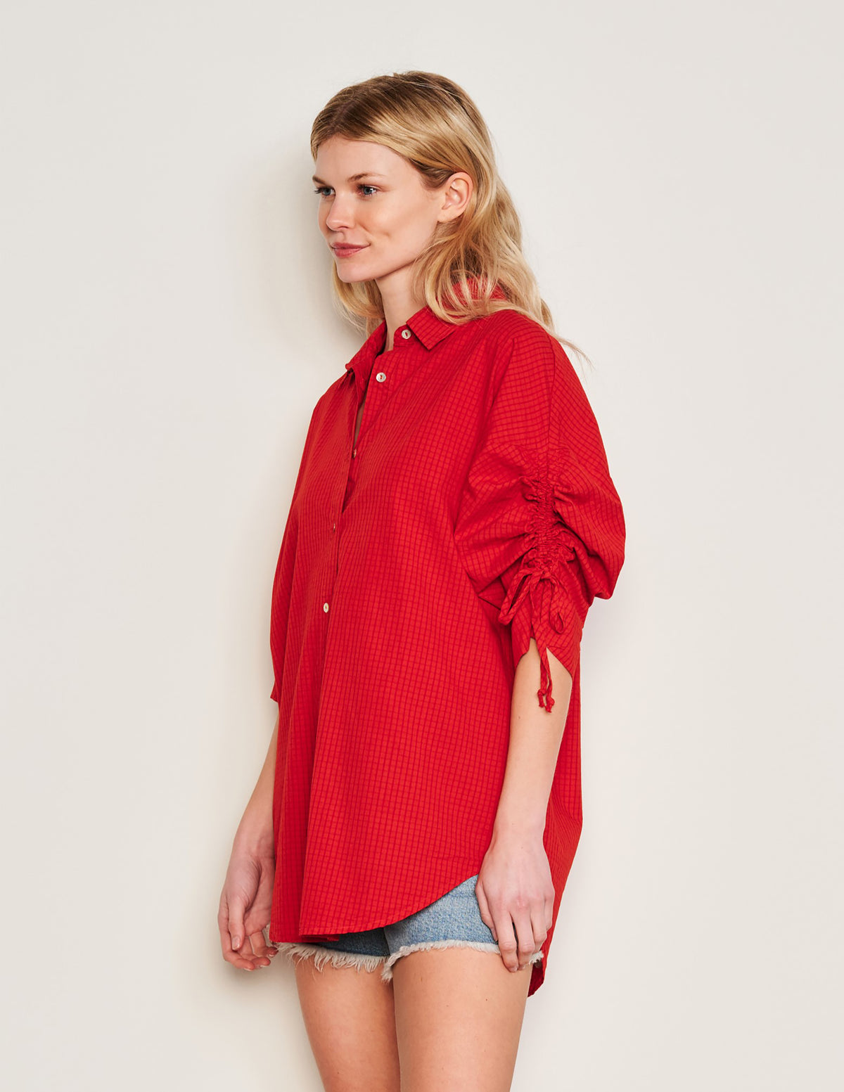  Sundry Beachside Check Short Shirt Dress in Burnt Red-side view and model is looking away from the camera