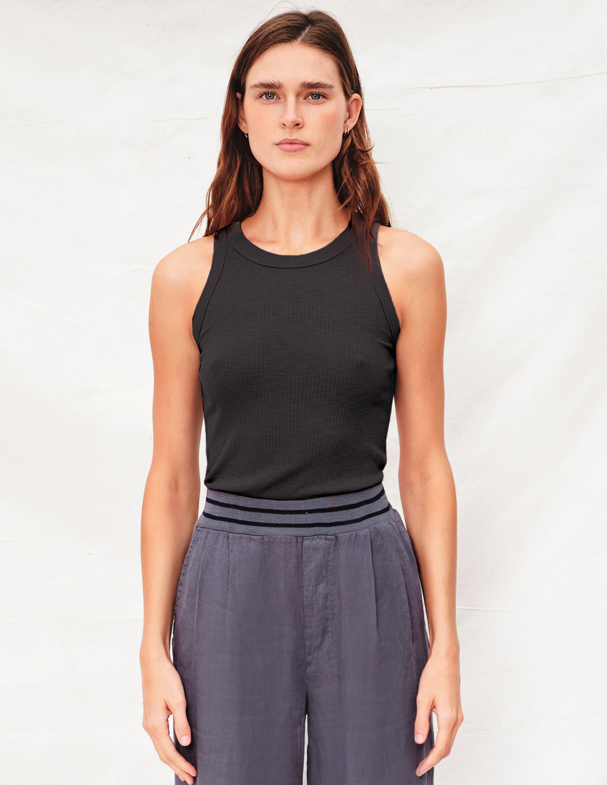 Sundry High Neck Tank in Black - front tucked in pant