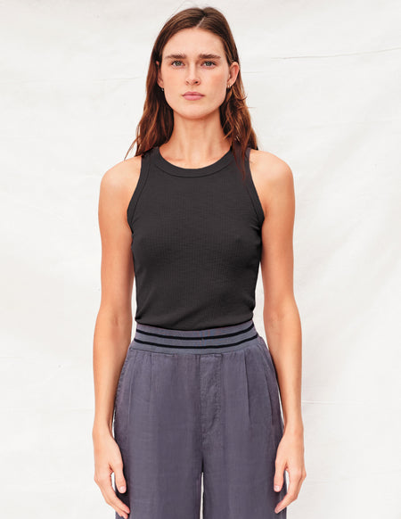 Sundry High Neck Tank in Black - front tucked in pant