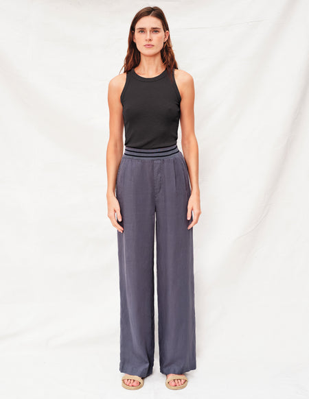 Sundry High Neck Tank in Black - front tucked in pant
